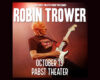 Poster promoting Robin Trower concert: guitarist on stage with white Stratocaster, bold white text 'ROBIN TROWER' and 'OCTOBER 13 PABST THEATER'